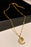 Inlaid Cubic Zirconia Moon Pendant Necklace
